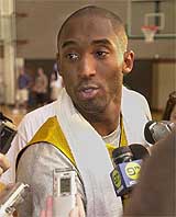 Los Angeles Lakers Kobe Bryant speaks to reporters after a team practice
