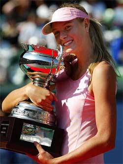 Maria Sharapova of Russia holds her trophy during award ceremonies in the Japan Open Tennis Tournament