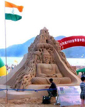 Sudarsan Pattnaik with his award-winning creation of the Buddha at the international sand sculpture competition in China.