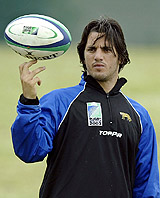 Argentina's national rugby team captain Agustin Pichot balances the ball during a training session