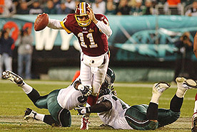Washington Redskins quarterback Patrick Ramsey tries to escape the clutches of Philadelphia Eagles defenders