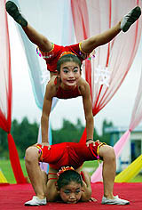 Young Chinese acrobats perform at the first equestrian festival