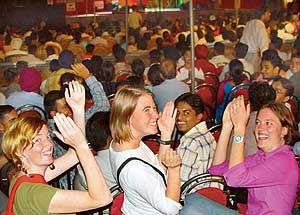 Foreign tourists enjoying at the live performance by renowned singer Sukhwinder Singh at Leisure Valley