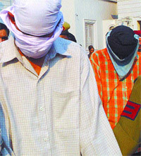 Two of the armymen, allegedly involved in the rape of JMC student, being produced at Patiala Courts