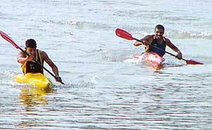 Territorial Army jawans take part in a canoeing competition 