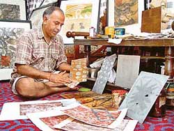 Print maker Nirmal Prakash works in his studio