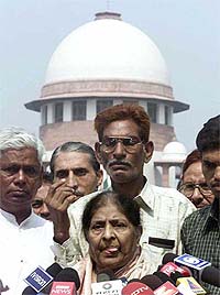 Ms Zakia Zafri, wife of Congress MP Ahsaan Zafri who was killed in Ahmedabad during the riots last year, talks to mediapersons