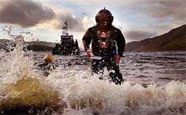 Lloyd Scott emerges from Loch Ness after finishing his underwater marathon
