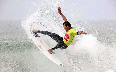 Reigning ASP world champion Andy Irons of the US performs in the Evian Air Show