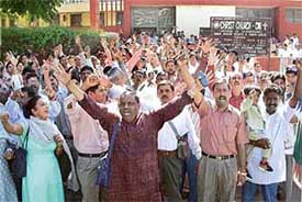Christians protest in front of the Sector 18 Christ Church in Chandigarh on Sunday to oppose police entry into the church