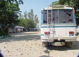 A damaged bus at Nanaksar Thath in Siahar village after Saturday night�s violent incidents