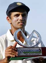 India�s Rahul Dravid displays his man-of-the match trophy