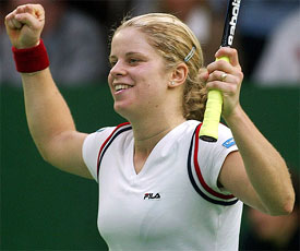 Belgium's Kim Clijsters celebrates her victory over compatriot Justine Henin-Hardenne 
