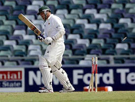 Zimbabwean captain Heath Streak is bowled on a no ball from Australia's Brett Lee 