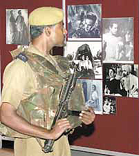 This security person is too enthralled by the stars of yesteryears to keep vigil during the 34th Film Festival at Siri Fort in the Capital on Tuesday.