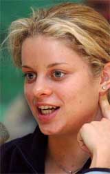 Belgium's Kim Clijsters answers a question at a Press conference in Zurich