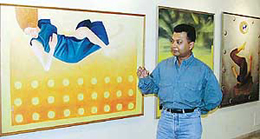 Sanjay Roy explains the artistic elements that govern his works currently showing at Art Folio in Sector 9, Chandigarh, on Wednesday.