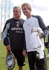 Real Madrid's David Beckham and Spanish tennis player Juan Carlos Ferrero strike a pose Madrid