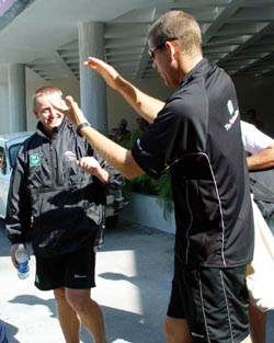 New Zealand's Scot Styris is all eyes and ears to team-mate Jacob Oram's animated narration 