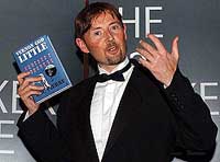 D. B. C. Pierre, winner of 2003 Man Booker Prize for fiction,  celebrates at the British Museum in London 