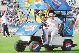 Verinder Sehwag �helps� the team keep its cool during the second day�s play of the first Test match