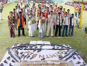 The United Liberation Front of Assam (ULFA) and National Democratic Front of Bodoland (NDFA) militants take oath to shun violence during a surrender ceremony at Tamulpur near Guwahati.�