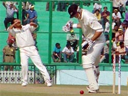 Sachin Tendulkar celebrates after bowling New Zealand captain Stephen Fleming on the second day of the second Test at PCA Stadium, Mohali, on Friday. New Zealand finished the day strongly on 536 for five. � Tribune photo by Manoj Mahajan