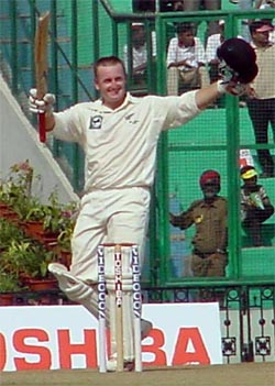 New Zealand�s Scott Styris acknowledges his century on the second day of the second Test against India at Mohali. � A Tribune photograph