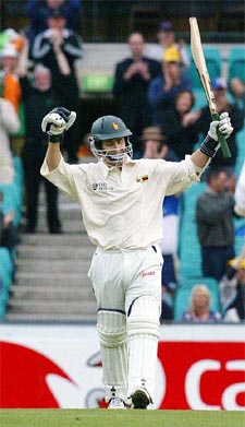 Zimbabwe's Stuart Carlisle celebrates his century on the first day of the second Test against Australia in Sydney. � AP/PTI photo
