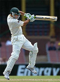 Australian batsman Ricky Ponting hits a four off the bowling of Zimbabwean captain Heath Streak 