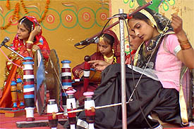 A traditional village scene being enacted at Punjabi Bhavan as a part of Prof Mohan Singh mela