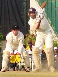 VVS Laxman hits a boundary on the fourth day of the second Test against New Zealand at PCA Stadium