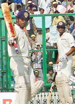 Sachin Tendulkar acknowledges his half century on the fourth day of the second Test against New Zealand
