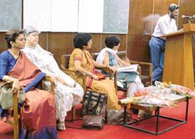 Prof Nirmalangshu Mukherji addresses a seminar on "POTA: Implications for Indian Democracy" at Panjab University on Sunday. Also seated on the stage is Ms Nandita Haskar, a leading legal expert.