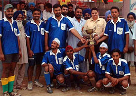 Members of the Gill Club of Ghawadi who won the Bibi Surjit Kaur Six-a-Side Hockey League Tournament at Jarkhar village