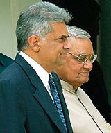 Sri Lankan Prime Minister Ranil Wickremesinghe with Prime Minister Atal Bihari Vajpayee in New Delhi on Monday.