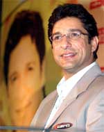 Former Pakistan cricket captain Wasim Akram addresses a Press conference in New Delhi 