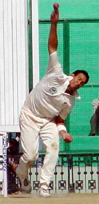 Daryl Tuffy bowls on the fifth day of the final Test at PCA Stadium