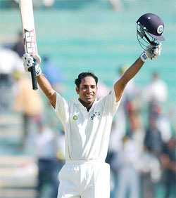V. V. S. Laxman celebrates his century on the fifth day of the second Test at PCA Stadium