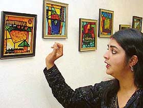 Artist Namita Ray explains her paintings at Art Folio in Sector 9, Chandigarh