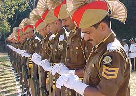 Policemen pay tributes to police martyrs at the Police Commemoration Day parade in Shimla 