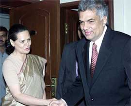 Congress President Sonia Gandhi shakes hand with Sri Lankan Prime Minister Ranil Wickremesinghe