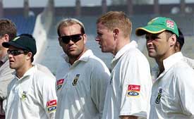 South African cricketers Mark Boucher, Jacques Kallis, Shaun Pollock and Gary Kirsten attend the awards ceremony after losing the first Test in Lahore 
