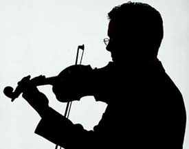 British violin expert Paul Hayday plays the Stradivari "Ex-Nachez", made in 1716 by famed Italian violin maker Antonio Stradivari, at Sotheby's in Hamburg