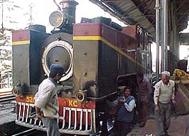 Railway workers get a �steam engine� ready for the celebrations of 100 years of the Shimla-Kalka railway track 
