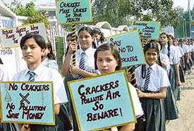 Students of Spring Dale Senior Secondary School hold a rally against the bursting of crackers in Ludhiana on Wednesday.