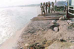 Repair work in progress on the Mukerian hydel canal near Tekrian village.