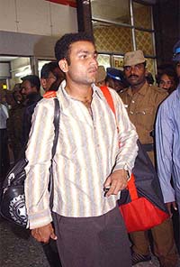 Virender Sehwag arrives at Chennai airport on Tuesday night for the tri-series tournament