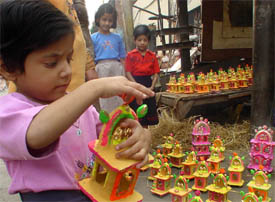Earthen replicas of temples which find no buyers this time