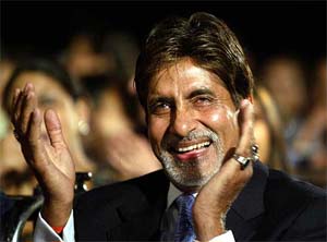 Bollywood superstar Amitabh Bachchan applauds at the Mumbai Police Divali Meet in Mumbai 